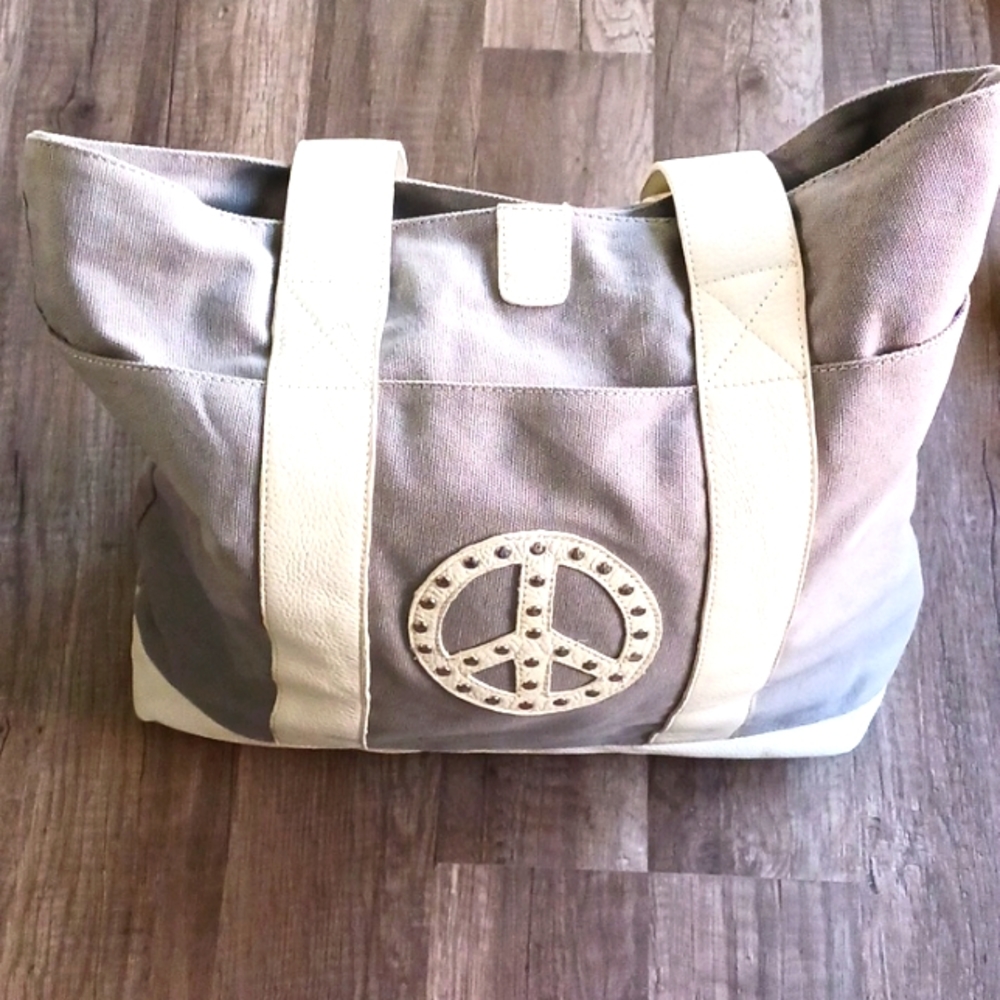 Large tote with studded peace sign.